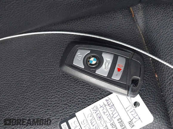 2015 BMW 5 Series 528i xDrive with VIN WBA5A7C59FG142685, listed as a IAAI auction lot 42181388 with 124,482 mi miles and . Bid and sale history available at DreamBid. Image 11.