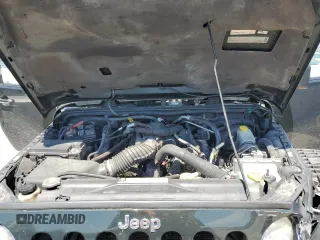 2010 Jeep Wrangler Rubicon with VIN 1J4BA6D12AL221220, listed as a Copart auction lot 56057055 with 200,346 mi miles and Salvage title. Bid and sale history available at DreamBid. Image 11.