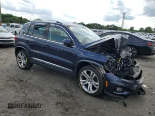 2016 Volkswagen Tiguan SEL with VIN WVGAV7AXXGW555809, listed as a Copart auction lot 55177805 with 40,676 mi miles and Salvage Title. Bid and sale history available at DreamBid. Image 4.