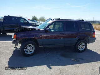 1996 Jeep Grand Cherokee Laredo with VIN 1J4GZ58S3TC391942, listed as a IAAI auction lot 41711778 with 202,765 mi miles. Bid and sale history available at carsss.com. Image 15.