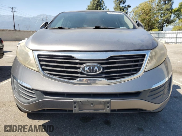 2012 Kia Sportage LX with VIN KNDPB3A22C7286908, listed as a Copart auction lot 58220115 with 171,114 mi miles and Clean title. Bid and sale history available at DreamBid. Image 5.