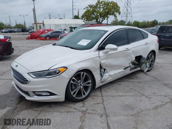 2017 Ford Fusion Titanium with VIN 3FA6P0K99HR272713, listed as a IAAI auction lot 41757334 with 104,733 mi miles. Bid and sale history available at carsss.com. Image 17.