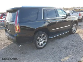 2018 Cadillac Escalade Luxury with VIN 1GYS3BKJ7JR291430, listed as a IAAI auction lot 41449233 with 128,281 mi miles. Bid and sale history available at carsss.com. Image 4.