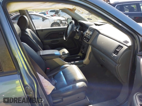 2006 Honda Pilot EX-L with VIN 2HKYF18506H521822, listed as a IAAI auction lot 42012612 with 187,946 mi miles and . Bid and sale history available at DreamBid. Image 5.