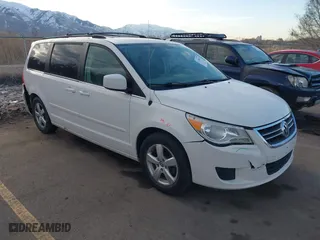 2009 Volkswagen Routan SE with VIN 2V8HW34129R586200, listed as a IAAI auction lot 41703225 with 147,656 mi miles. Bid and sale history available at carsss.com. Image 1.
