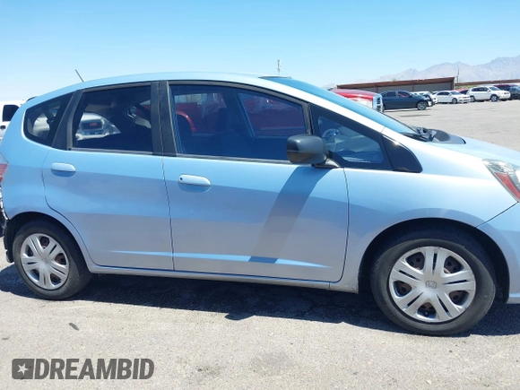 2009 Honda Fit z VIN JHMGE88259S037601, wystawiony jako IAAI lot #42428704 z przebiegiem 55 823 mil mil oraz . Historia ofert i sprzedaży dostępna na DreamBid. Obrazek 14.