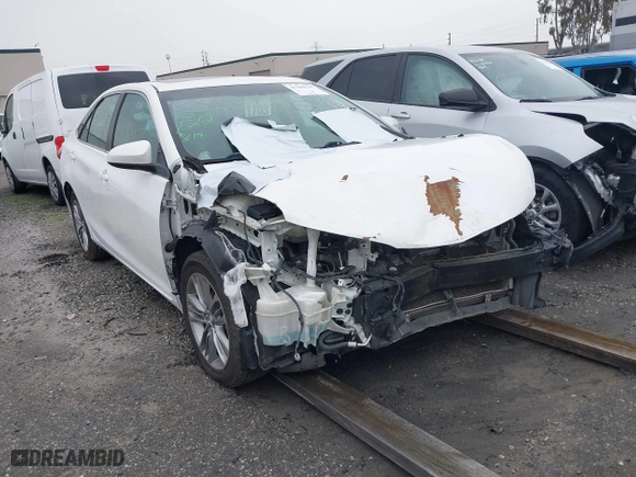 2015 Toyota Camry Hybrid LE with VIN 4T1BD1FK9FU148950, listed as a IAAI auction lot 41360155 with 106,069 mi miles. Bid and sale history available at carsss.com. Image 1.