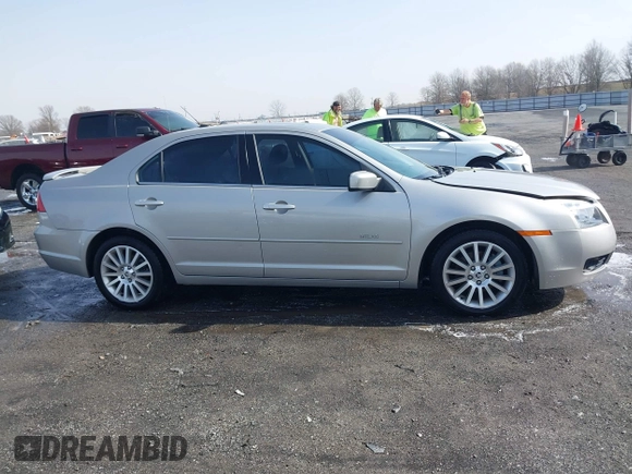 2007 Mercury Milan Premier z VIN 3MEHM02157R637133, wystawiony jako IAAI lot #41474849 z przebiegiem 101 372 mil mil oraz . Historia ofert i sprzedaży dostępna na DreamBid. Obrazek 13.
