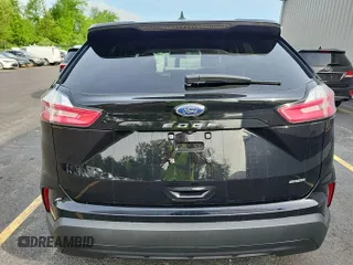 2022 Ford Edge SE z VIN 2FMPK4G91NBA60925, wystawiony jako IAAI lot #42407498 z przebiegiem 76 875 mil mil oraz . Historia ofert i sprzedaży dostępna na DreamBid. Obrazek 1.