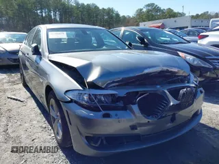 2012 BMW 5 Series 528i with VIN WBAXG5C56CDX06186, listed as a IAAI auction lot 41586039 with 130,114 mi miles. Bid and sale history available at carsss.com. Image 1.