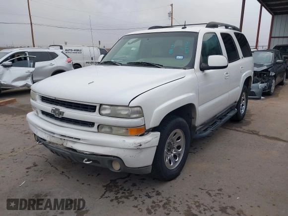 2002 Chevrolet Tahoe Z71 with VIN 1GNEK13Z22R303223, listed as a IAAI auction lot 41527148 with 211,835 mi miles. Bid and sale history available at carsss.com. Image 19.