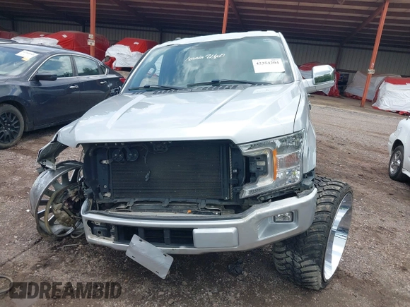 2018 Ford F-150 XL z VIN 1FTEW1CP4JFB37718, wystawiony jako IAAI lot #42354204 z przebiegiem 141 689 mil mil oraz . Historia ofert i sprzedaży dostępna na DreamBid. Obrazek 12.