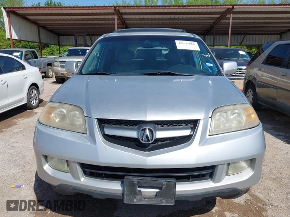 2005 Acura MDX with VIN 2HNYD18205H552503, listed as a IAAI auction lot 42004868 with 210,814 mi miles. Bid and sale history available at carsss.com. Image 12.