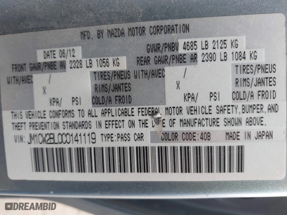 2012 Mazda Mazda5 Sport with VIN JM1CW2BL0C0141119, listed as a IAAI auction lot 42073200 with 142,805 mi miles. Bid and sale history available at carsss.com. Image 9.