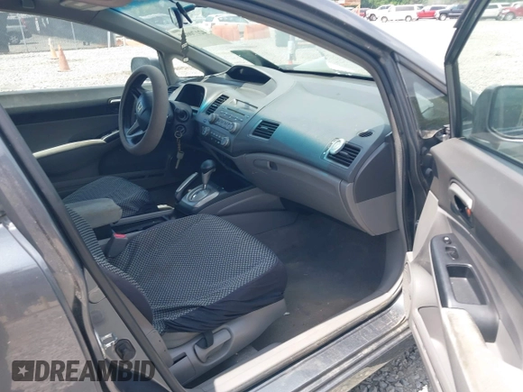 2011 Honda Civic LX with VIN 19XFA1F52BE045256, listed as a IAAI auction lot 42170028 with 222,168 mi miles and . Bid and sale history available at DreamBid. Image 5.