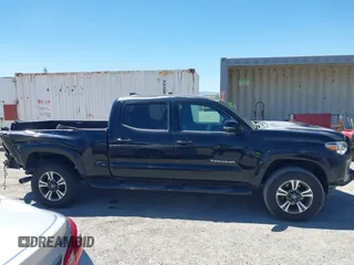 2018 Toyota Tacoma SR5 with VIN 3TMBZ5DN1JM014540, listed as a IAAI auction lot 42505324 with 112,990 mi miles and . Bid and sale history available at DreamBid. Image 13.