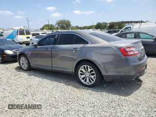 2013 Ford Taurus Limited z VIN 1FAHP2F85DG234922, wystawiony jako Copart lot #65851575 z przebiegiem 164 958 mil mil oraz Czysty tytuł • Clean title. Historia ofert i sprzedaży dostępna na DreamBid. Obrazek 2.