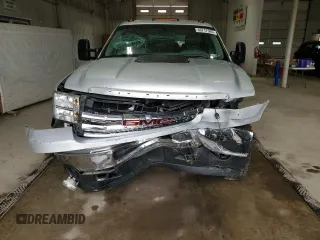 2013 GMC Sierra 2500HD Work Truck с VIN 1GT12ZCGXDF118085, выставлен на аукционе Copart как лот 59717505 с пробегом 187 063 миль миль и Списание • Salvage title. История ставок и продаж доступна на DreamBid. Изображение 5.