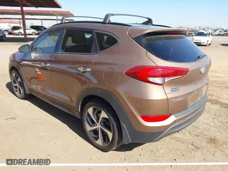 2016 Hyundai Tucson Sport with VIN KM8J33A20GU211615, listed as a IAAI auction lot 41685718 with 97,458 mi miles. Bid and sale history available at carsss.com. Image 3.