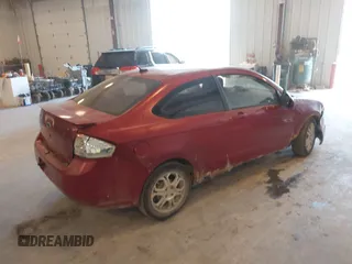 2009 Ford Focus SE with VIN 1FAHP32N49W222419, listed as a IAAI auction lot 42113655 with 238,936 mi miles. Bid and sale history available at carsss.com. Image 4.
