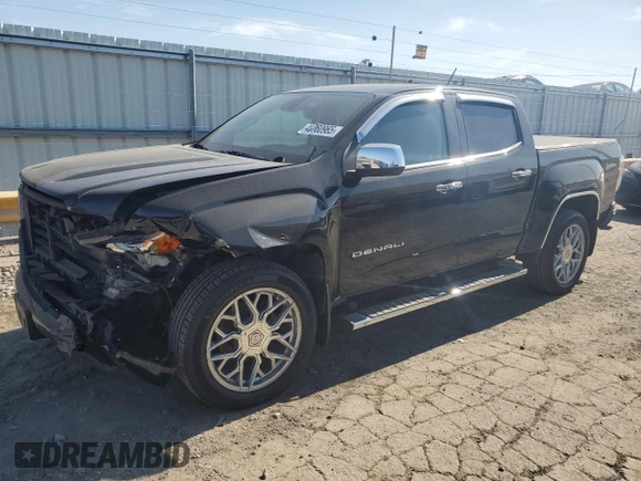 2021 GMC Canyon 4WD Denali with VIN 1GTG6EEN4M1221938, listed as a Copart auction lot 48760965 with 63,231 mi miles and Salvage Title. Bid and sale history available at carsss.com. Image 1.