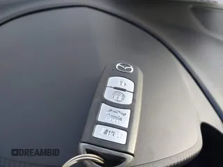 2016 Mazda 3 i Touring with VIN JM1BM1L73G1328111, listed as a IAAI auction lot 41188695 with 111,597 mi miles and . Bid and sale history available at DreamBid. Image 11.