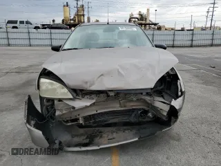 2005 Ford Focus S with VIN 1FAFP34N55W105530, listed as a Copart auction lot 59186695 with 136,204 mi miles and Salvage title. Bid and sale history available at DreamBid. Image 5.