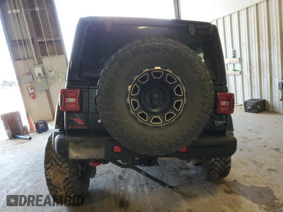 2020 Jeep Wrangler Unlimited Recon with VIN 1C4HJXFN0LW263201, listed as a Copart auction lot 79129424 with 73,405 mi miles and Salvage title. Bid and sale history available at DreamBid. Image 6.