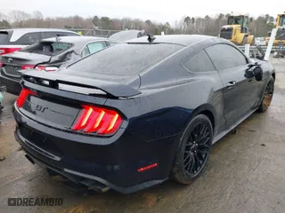 2021 Ford Mustang GT with VIN 1FA6P8CFXM5106832, listed as a IAAI auction lot 41512413 with 22,171 mi miles. Bid and sale history available at carsss.com. Image 4.