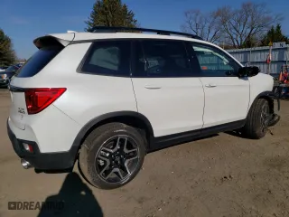 2023 Honda Passport Elite with VIN 5FNYF8H09PB037418, listed as a Copart auction lot 42770504 with 3,852 mi miles. Bid and sale history available at carsss.com. Image 3.