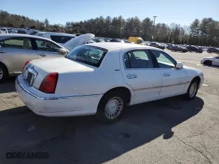 2001 Lincoln Town Car Executive with VIN 1LNHM81W11Y727557, listed as a Copart auction lot 43705545 with 59,273 mi miles and Salvage Title. Bid and sale history available at carsss.com. Image 3.
