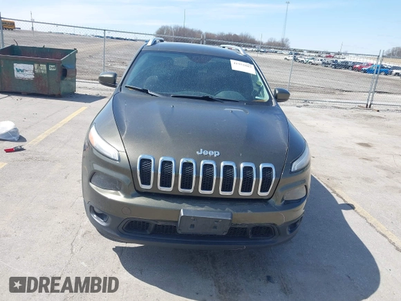 2015 Jeep Cherokee North with VIN 1C4PJMCS9FW588826, listed as a IAAI auction lot 41952883 with 145,586 mi miles. Bid and sale history available at carsss.com. Image 13.