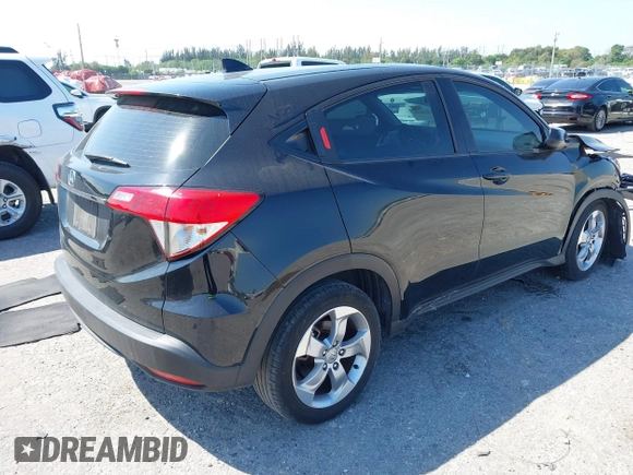 2021 Honda HR-V LX with VIN 3CZRU5H34MM726934, listed as a IAAI auction lot 41797859 with 139,927 mi miles. Bid and sale history available at carsss.com. Image 4.