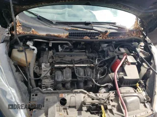 2016 Ford Fiesta SE z VIN 3FADP4EJ3GM155158, wystawiony jako Copart lot #55883465 z przebiegiem 116 184 mil mil oraz Czysty tytuł • Clean title. Historia ofert i sprzedaży dostępna na DreamBid. Obrazek 11.