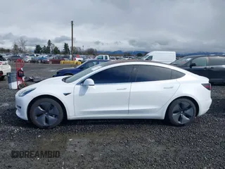 2018 Tesla Model 3 Long Range Battery with VIN 5YJ3E1EA3JF013253, listed as a IAAI auction lot 41752102 with 84,459 mi miles. Bid and sale history available at carsss.com. Image 14.