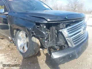 2015 Chevrolet Suburban LTZ with VIN 1GNSKKKC4FR635949, listed as a IAAI auction lot 41796028 with 172,818 mi miles. Bid and sale history available at carsss.com. Image 6.
