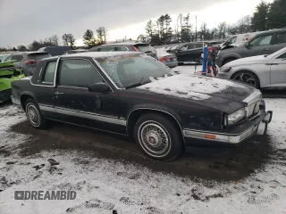 1988 Cadillac Eldorado with VIN 1G6EL1155JU622216, listed as a Copart auction lot 83659204 with 44,668 mi miles and Salvage Title. Bid and sale history available at DreamBid. Image 4.