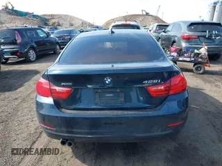 2016 BMW 4 Series 428i xDrive with VIN WBA4C9C56GG141089, listed as a IAAI auction lot 41587479 with 85,462 mi miles and . Bid and sale history available at DreamBid. Image 16.