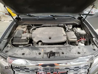 2021 GMC Canyon 4WD Denali with VIN 1GTG6EEN3M1129459, listed as a Copart auction lot 87618305 with 37,663 mi miles and Salvage Title. Bid and sale history available at carsss.com. Image 11.