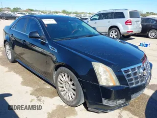 2012 Cadillac CTS Luxury with VIN 1G6DE5E54C0151029, listed as a IAAI auction lot 41844378 with 181,246 mi miles and . Bid and sale history available at DreamBid. Image 1.