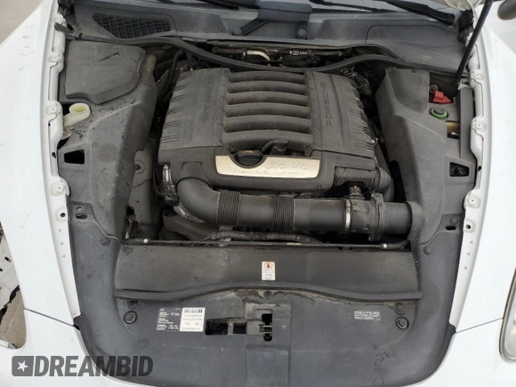 2014 Porsche Cayenne with VIN WP1AA2A26ELA97481, listed as a Copart auction lot 53707755 with 185,787 mi miles and Salvage title. Bid and sale history available at DreamBid. Image 12.