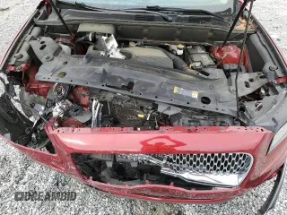 2019 Lincoln Nautilus Reserve z VIN 2LMPJ6L9XKBL57034, wystawiony jako Copart lot #51652415 z przebiegiem 51 302 mil mil oraz Szkoda całkowita • Salvage title. Historia ofert i sprzedaży dostępna na DreamBid. Obrazek 13.