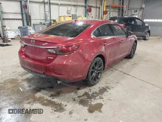 2016 Mazda Mazda6 i Grand Touring with VIN JM1GJ1W54G1432681, listed as a IAAI auction lot 41624888 with 100,410 mi miles. Bid and sale history available at carsss.com. Image 4.