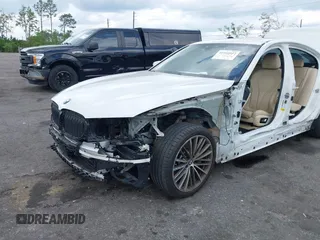 2018 BMW 5 Series 530i with VIN WBAJA5C55JWA38747, listed as a IAAI auction lot 41922937 with 100,951 mi miles and . Bid and sale history available at DreamBid. Image 6.