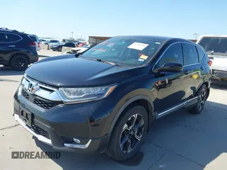2018 Honda CR-V Touring with VIN 2HKRW2H91JH630702, listed as a IAAI auction lot 41983516 with 84,355 mi miles. Bid and sale history available at carsss.com. Image 2.