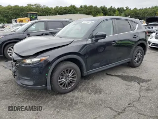 2020 Mazda CX-5 Touring with VIN JM3KFBCMXL0725232, listed as a Copart auction lot 72377954 with 64,625 mi miles and Salvage Title. Bid and sale history available at DreamBid. Image 1.
