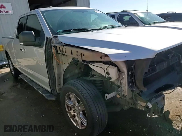 2015 Ford F-150 XL with VIN 1FTEX1C88FFC26544, listed as a Copart auction lot 48242705 with 124,731 mi miles and Salvage Title. Bid and sale history available at carsss.com. Image 14.