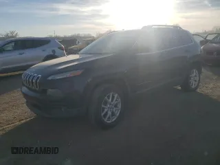 2014 Jeep Cherokee Latitude with VIN 1C4PJMCSXEW260457, listed as a Copart auction lot 76585553 with 84,957 mi miles and Salvage Title. Bid and sale history available at carsss.com. Image 1.