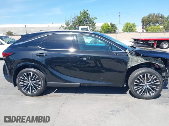 2023 Lexus RX 350h z VIN 2T2BBMCA1PC005914, wystawiony jako IAAI lot #42200587 z przebiegiem 22 480 mil mil oraz . Historia ofert i sprzedaży dostępna na DreamBid. Obrazek 14.