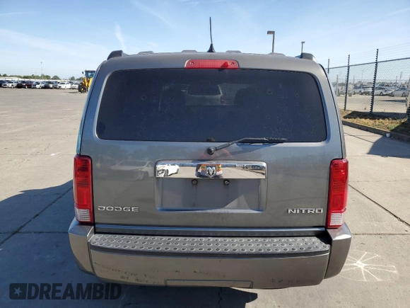 2011 Dodge Nitro Heat z VIN 1D4PT4GK8BW605665, wystawiony jako Copart lot #56986705 z przebiegiem 216 699 mil mil oraz Szkody całkowita. Historia ofert i sprzedaży dostępna na DreamBid. Obrazek 6.